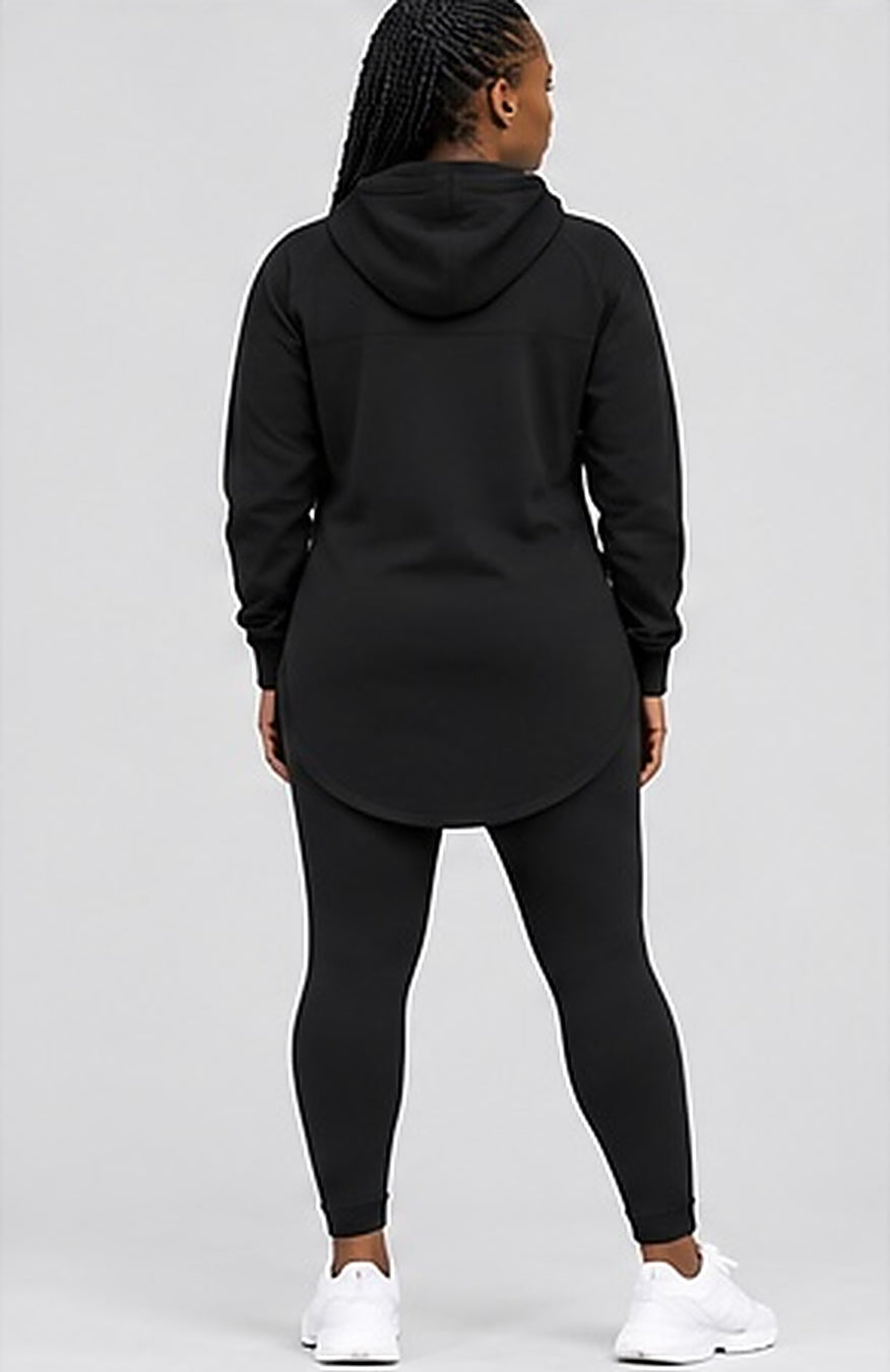 Back view of the GE black elongated hoodie and leggings set showing the curved hem covering the seat.