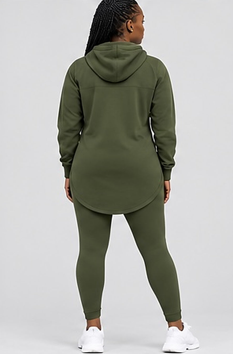 Back view of the GE olive green elongated hoodie and leggings showing the curved hem covering the seat.