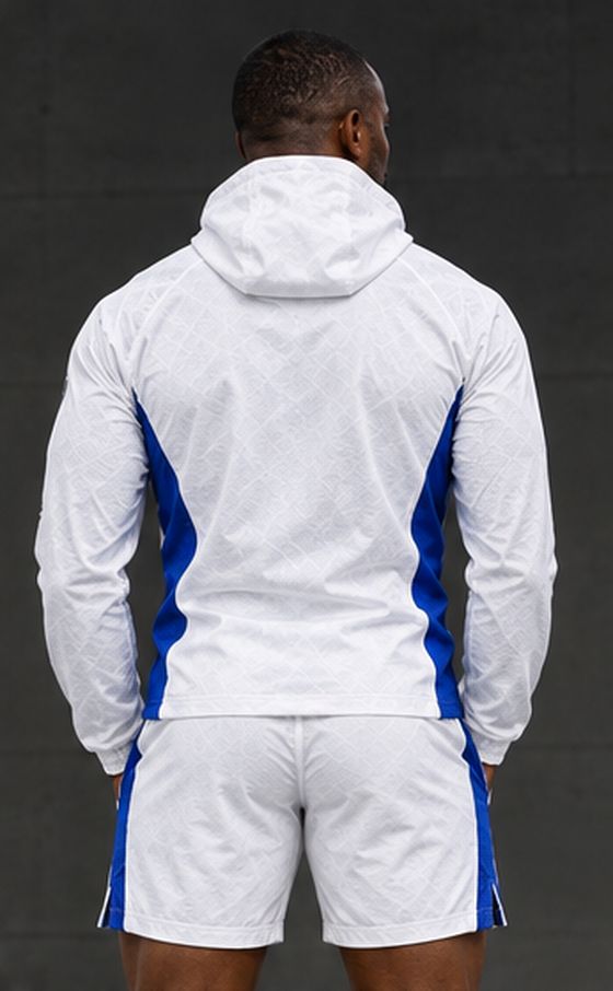 Back view of the GE white hooded jacket and matching shorts showing the contrasting blue side panels.